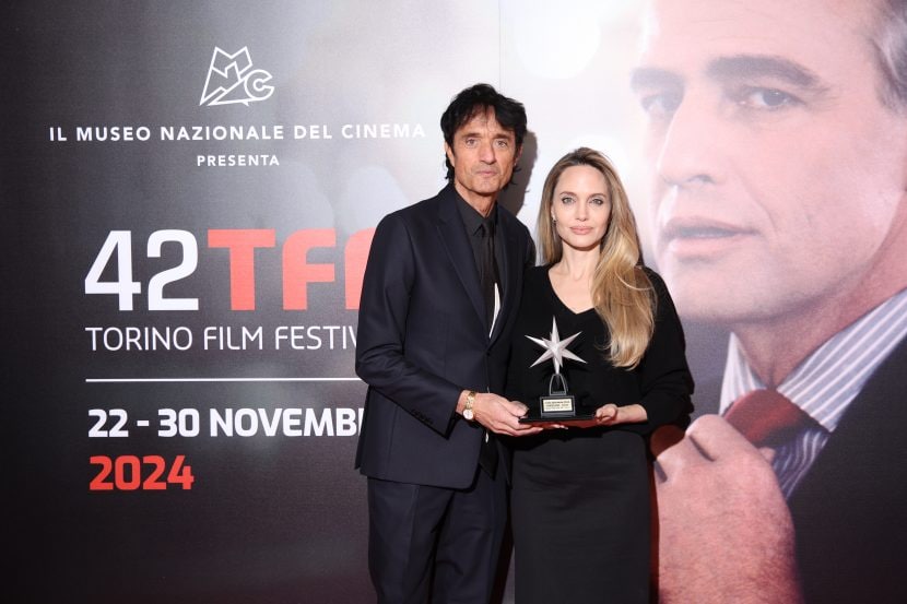 Angelina Jolie con Giulio Base, direttore artistico del 42 Torino Film Festival.